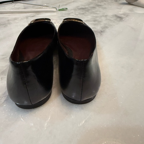 Tory Burch Black Flats with Gold Emblem - Picture 3 of 5